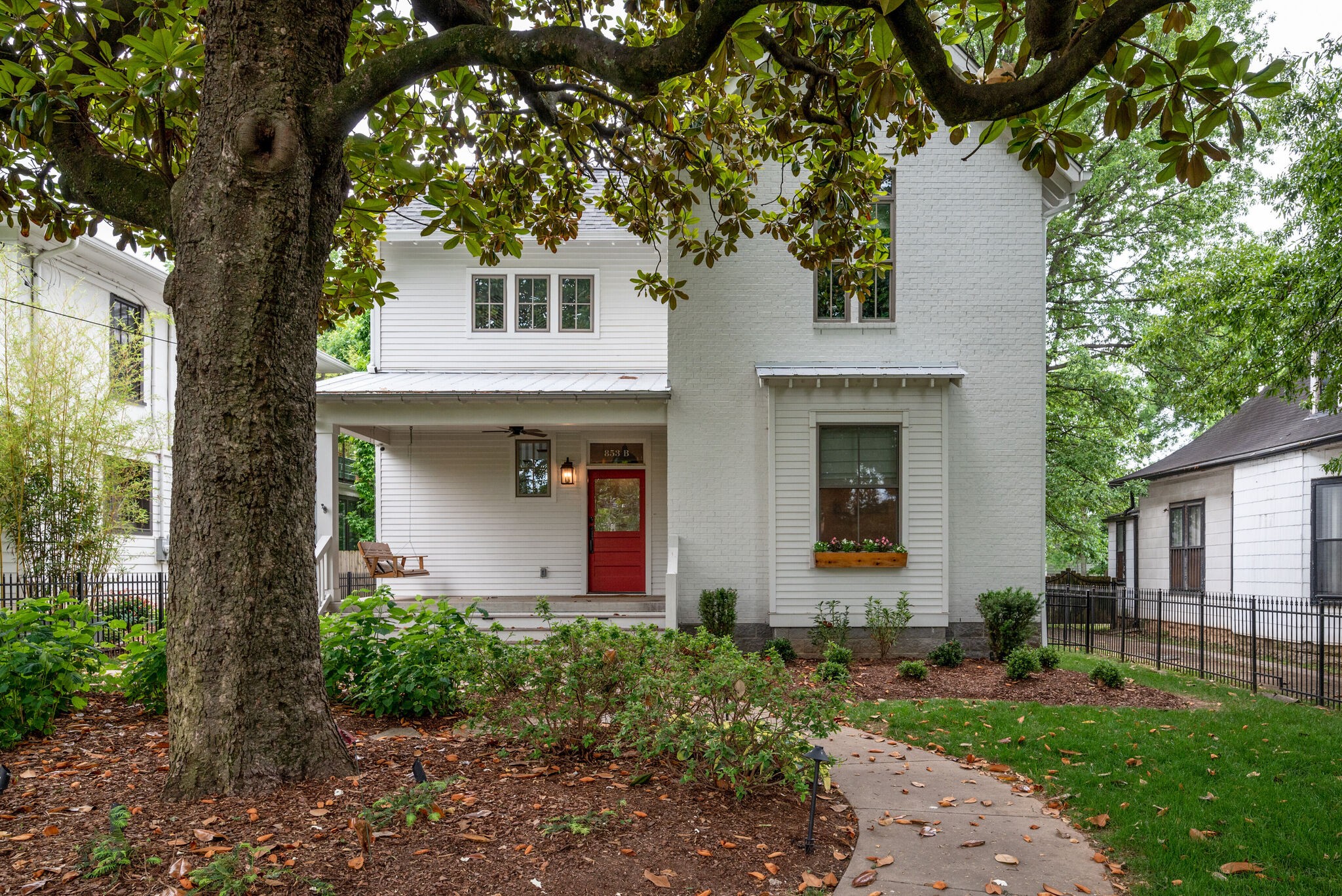 853 B Bradford Avenue Nashville, TN 37204 - Photo 5 of 49 front view of a house with a yard