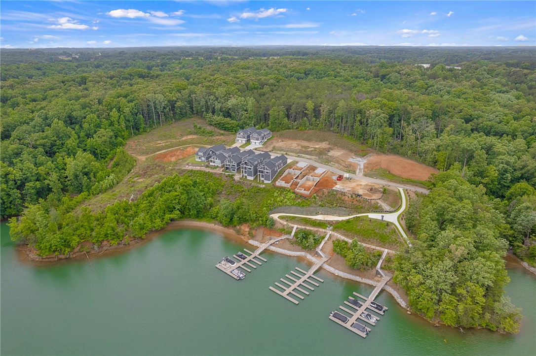 1230 Melton Road, Unit 216 West Union, SC 29696 - Photo 43 of 49 Perched above a serene lake, a collection of homes awaits with private boat slips.