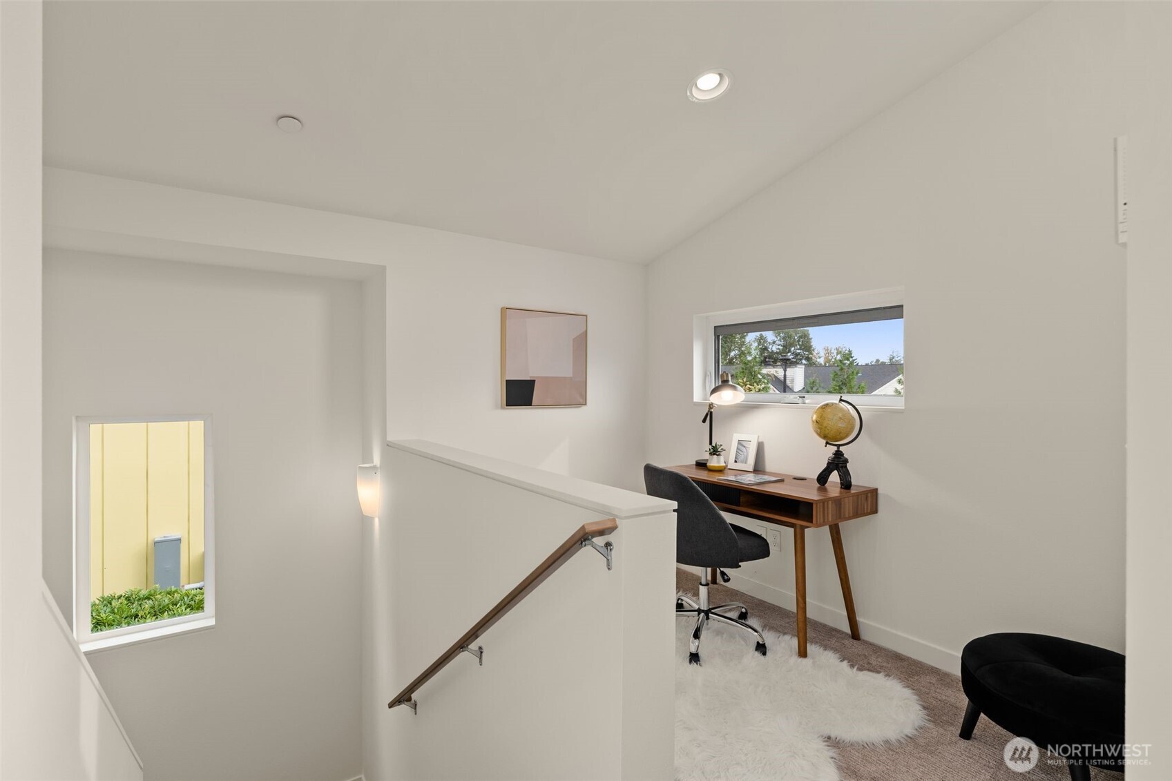 6012 South 127th Lane Seattle, WA 98178 - Photo 20 of 35 a view of a workspace with furniture and a window