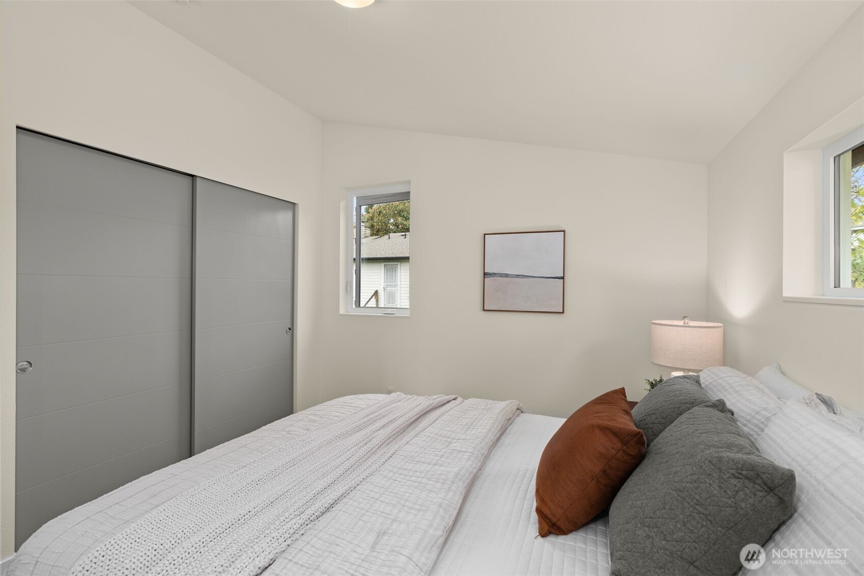 6012 South 127th Lane Seattle, WA 98178 - Photo 23 of 35 a bedroom with a bed and a window