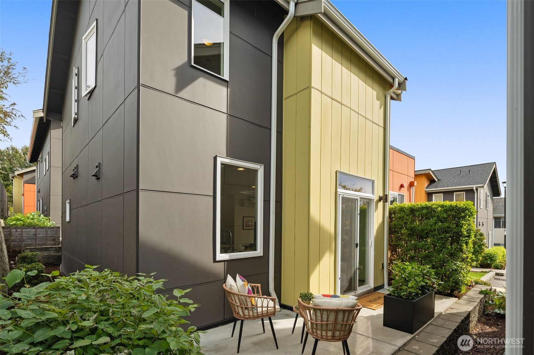 6012 South 127th Lane Seattle, WA 98178 - Photo 27 of 35 a view of a house with backyard and sitting area