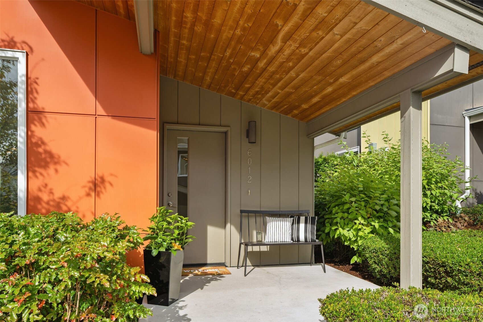 6012 South 127th Lane Seattle, WA 98178 - Photo 6 of 35 a front view of a house with garden