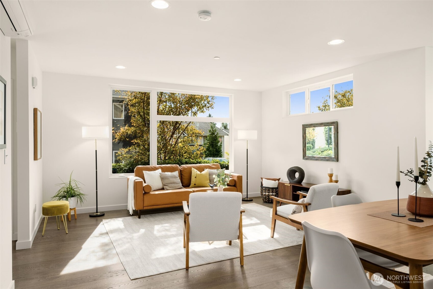 6012 South 127th Lane Seattle, WA 98178 - Photo 9 of 35 a living room with furniture and a large window