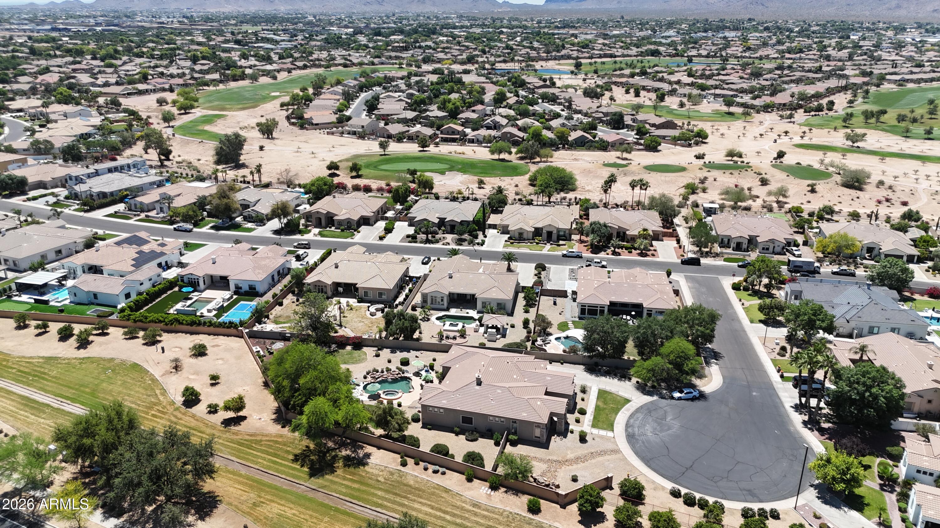 6427 South Magic Court Gilbert, AZ 85298 - Photo 2 of 71 an aerial view of residential houses with outdoor space