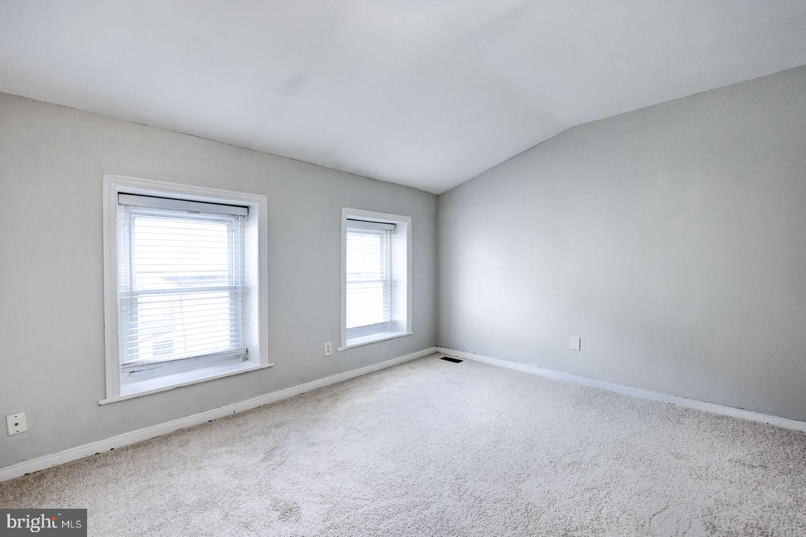 4442 Baker Street Philadelphia, PA 19127 - Photo 23 of 23 an empty room with windows