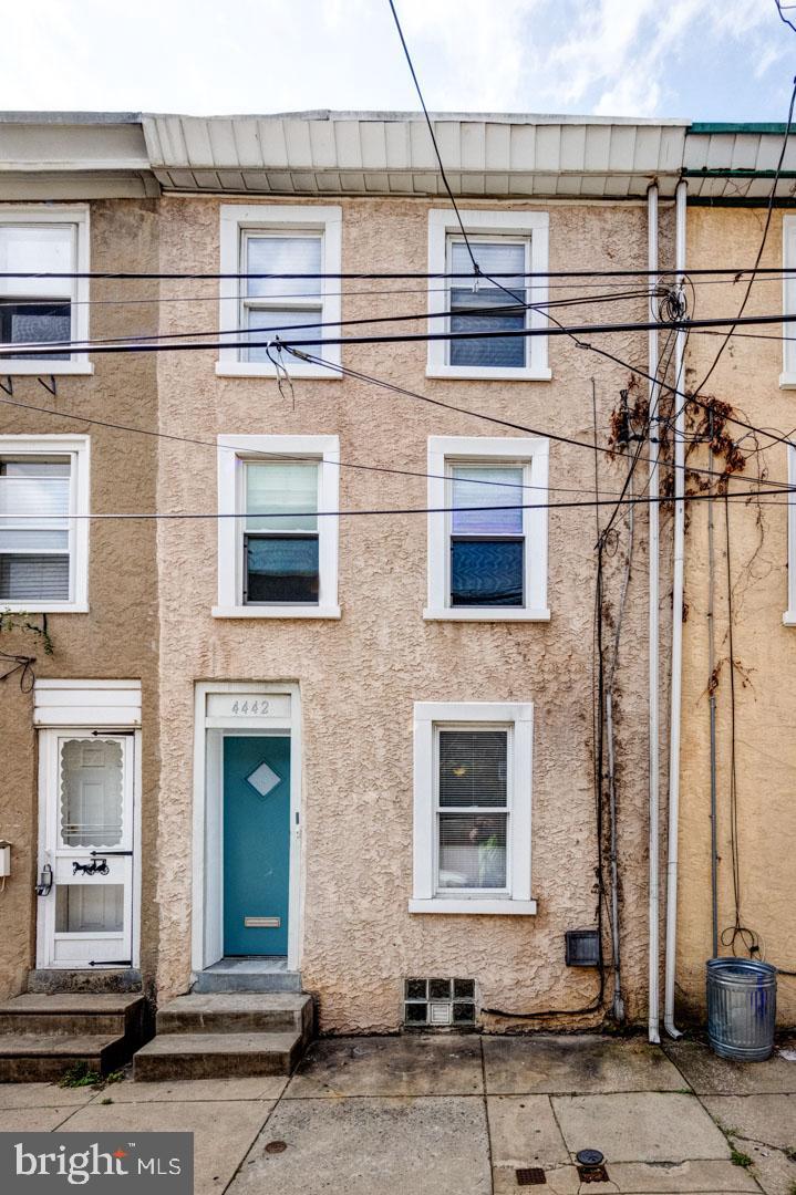 4442 Baker Street Philadelphia, PA 19127 - Photo 4 of 23 a front view of a house with a street