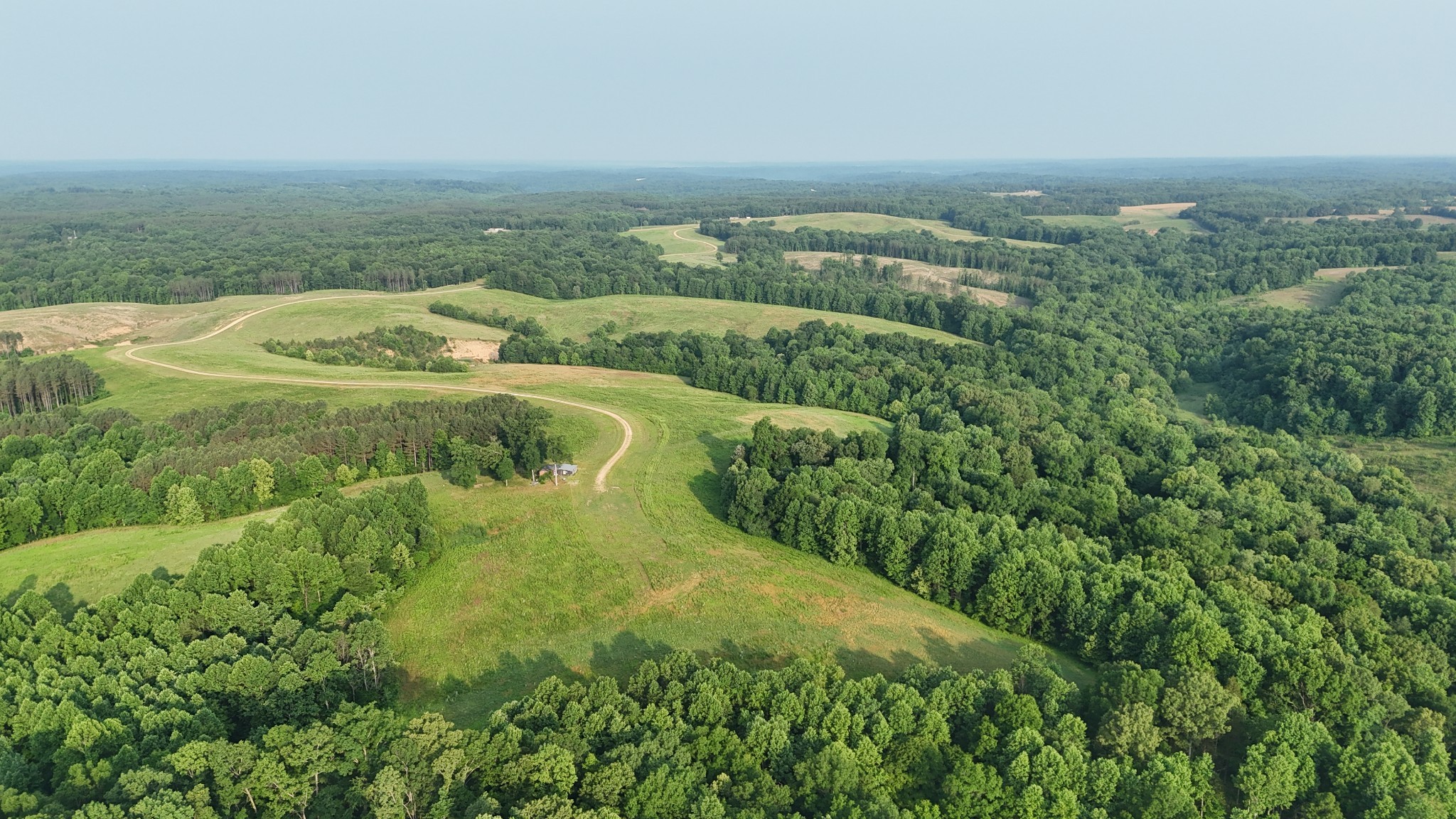 0 Seven 7 Mile Ridge Road Indian Mound, TN 37079 - Photo 15 of 34 an aerial view of residential houses with outdoor space and trees