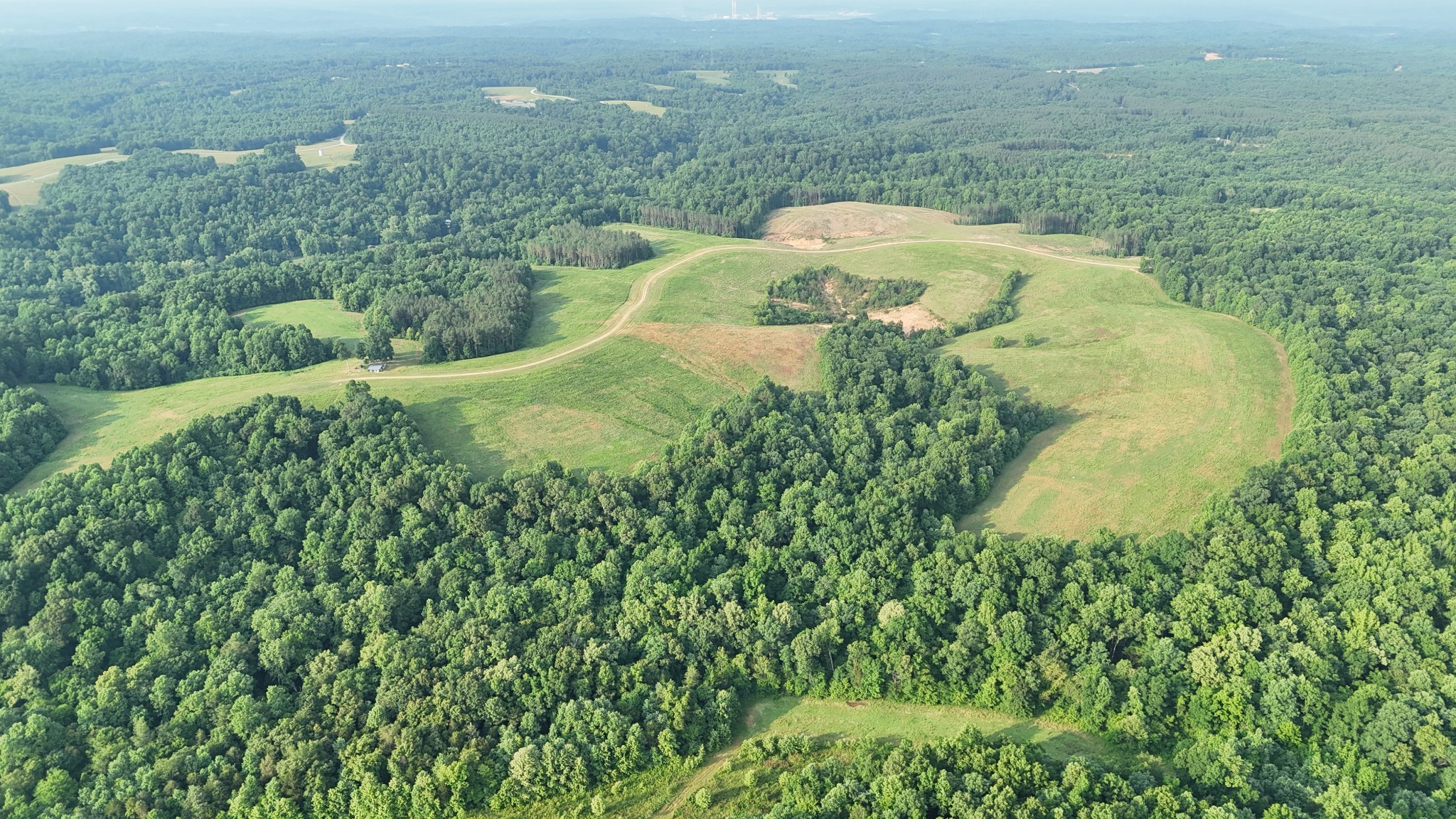 0 Seven 7 Mile Ridge Road Indian Mound, TN 37079 - Photo 20 of 34 an aerial view of residential house with outdoor space