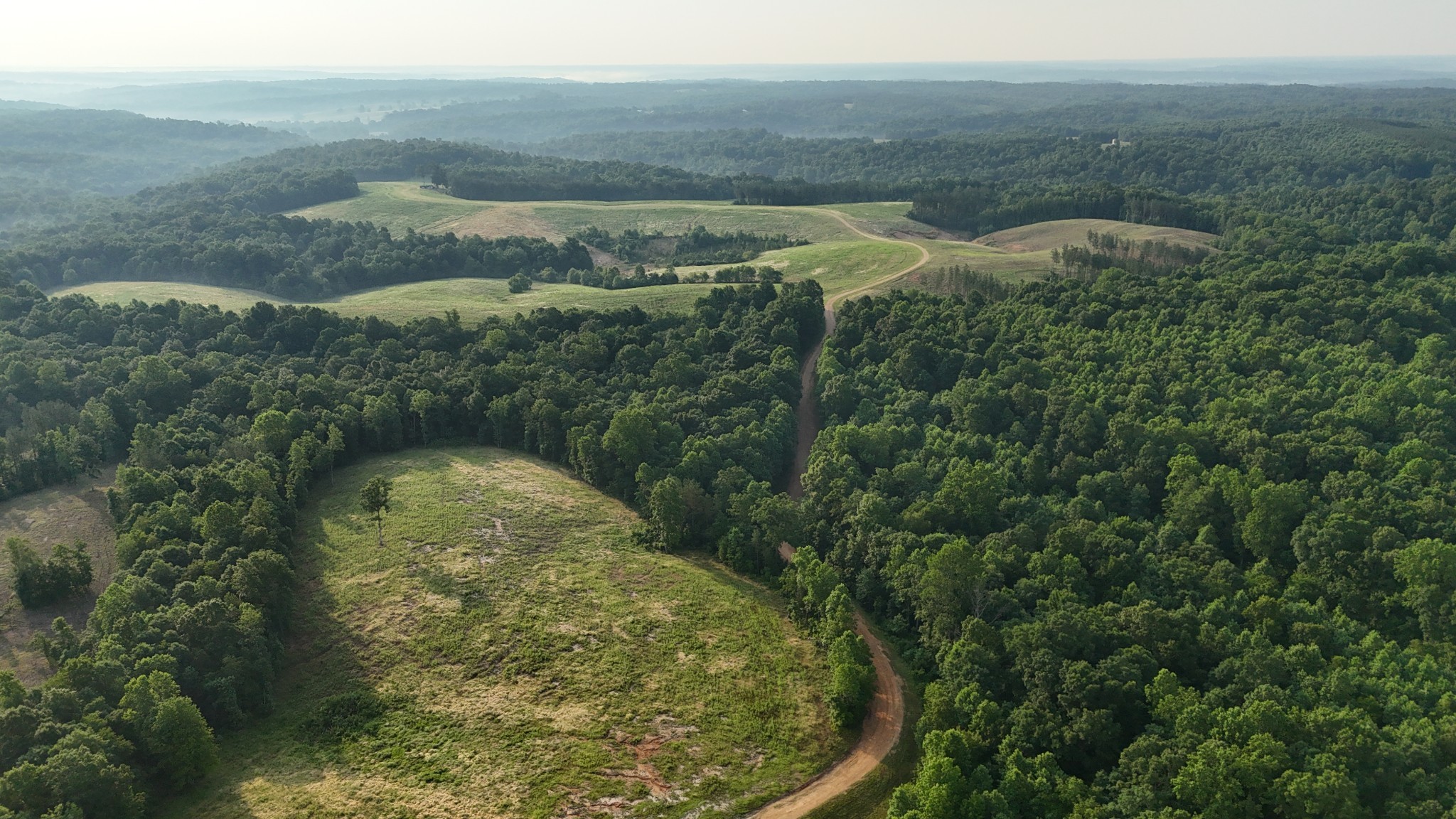 0 Seven 7 Mile Ridge Road Indian Mound, TN 37079 - Photo 24 of 34 a view of a lake from a yard