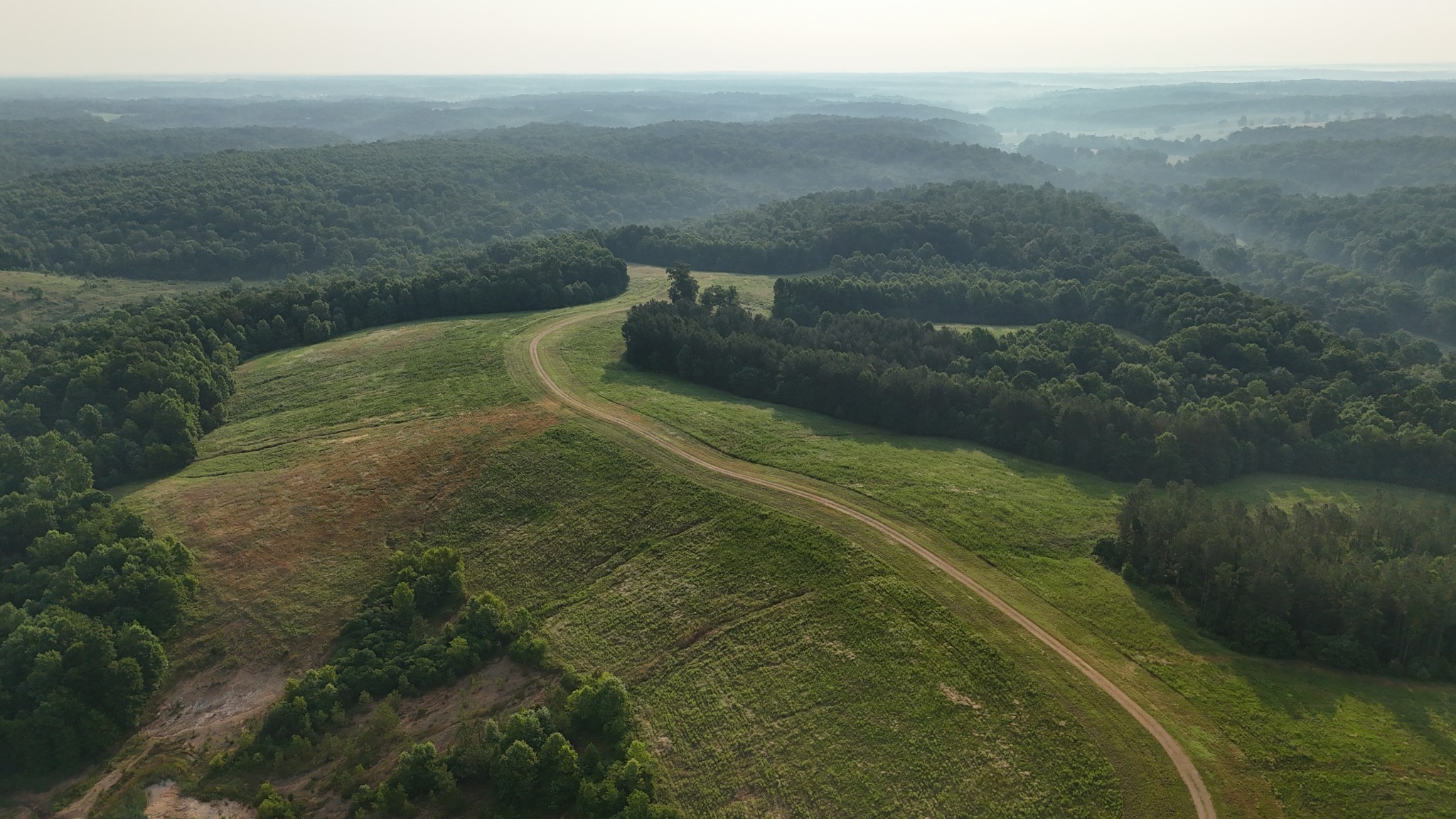 0 Seven 7 Mile Ridge Road Indian Mound, TN 37079 - Photo 28 of 34 a view of a lake from a yard