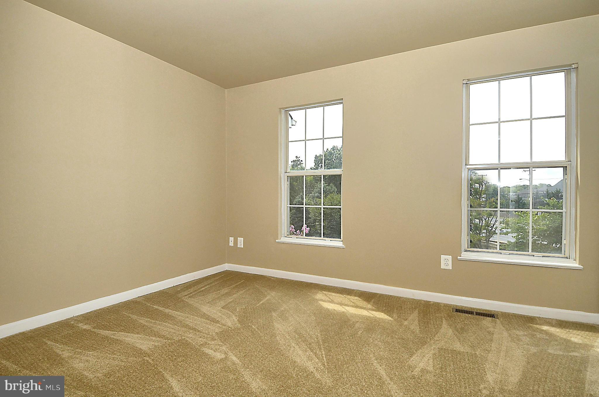 6405 Racetec Court Springfield, VA 22150 - Photo 14 of 30 a view of an empty room with a window