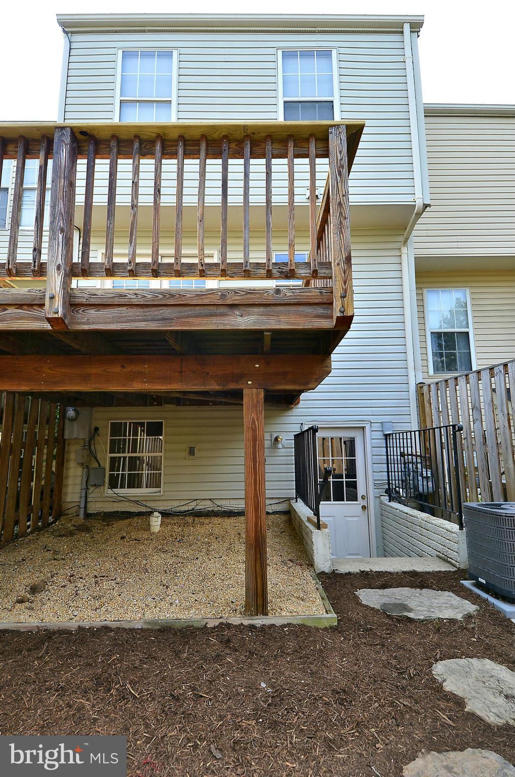 6405 Racetec Court Springfield, VA 22150 - Photo 24 of 30 a view of a house with a porch