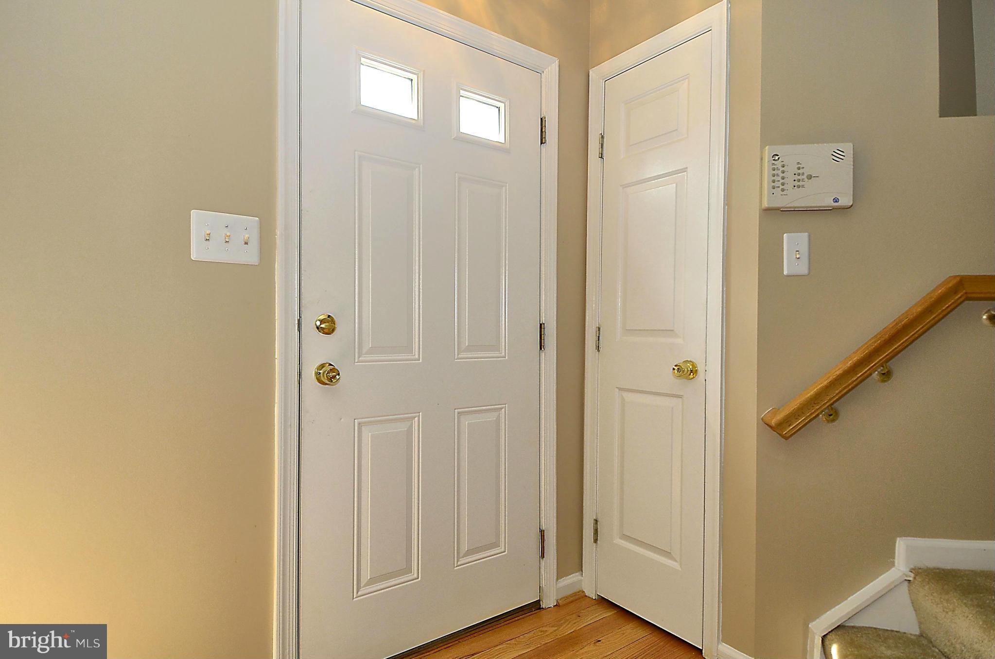 6405 Racetec Court Springfield, VA 22150 - Photo 4 of 30 a view of a bathroom with wooden floor