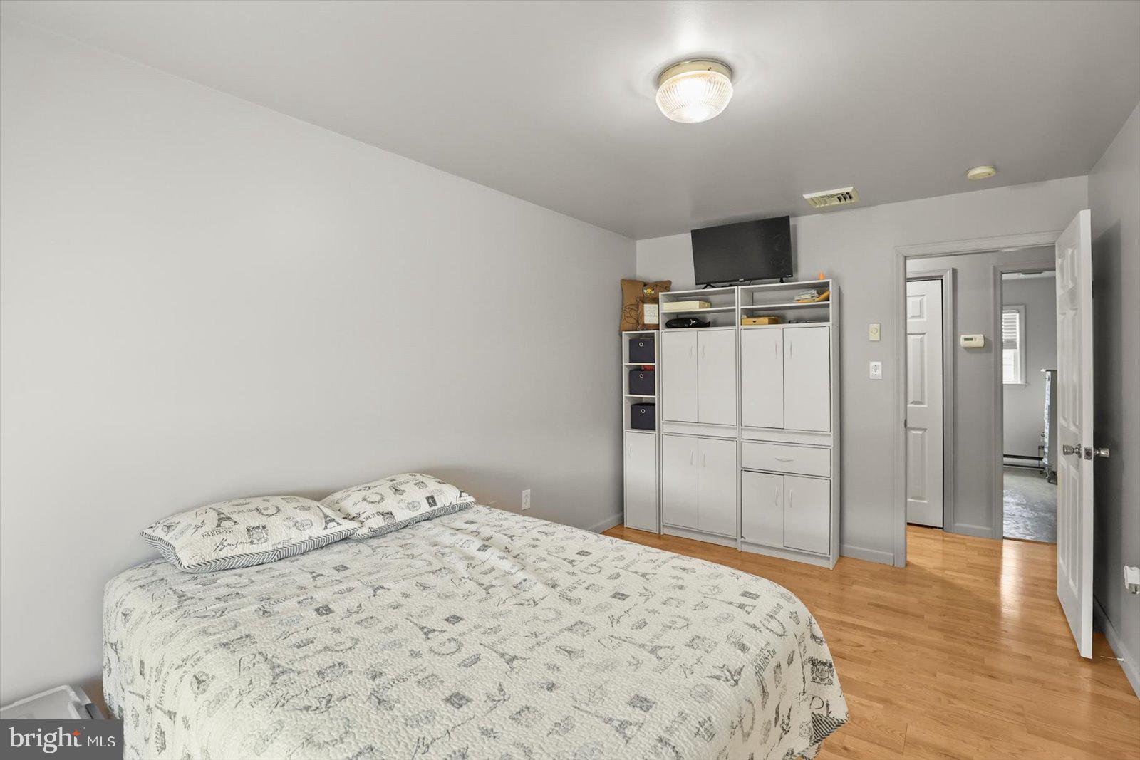 21 Skyport Road Mechanicsburg, PA 17050 - Photo 23 of 35 a bedroom with a bed and a television