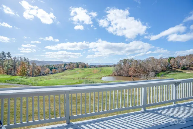 a view of a balcony with city view
