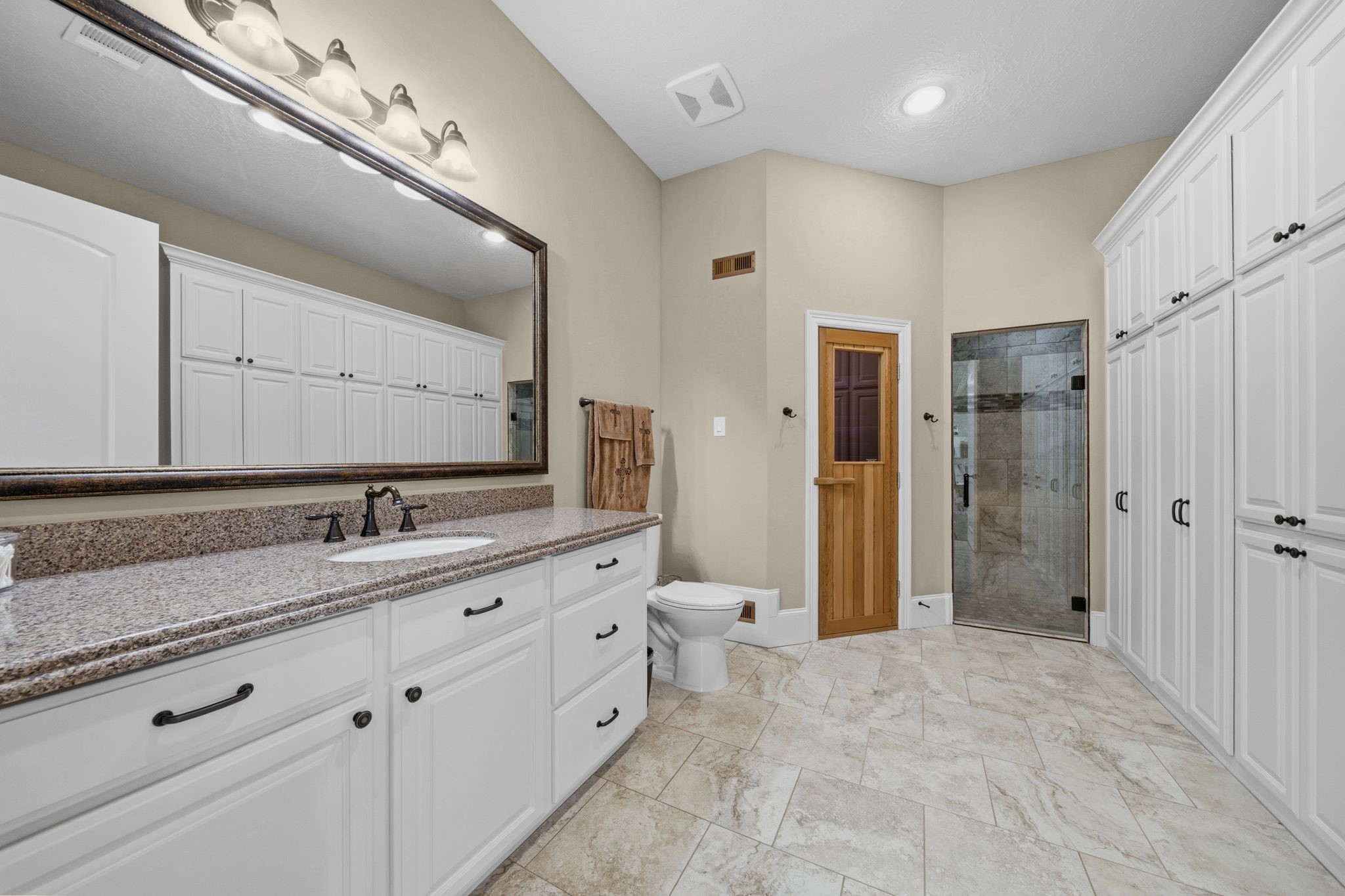 21620 Schiel Road Cypress, TX 77433 - Photo 32 of 49 View of the bathroom/locker room. On the left is the door to the sauna.