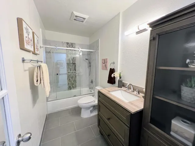 a room with table and mirror