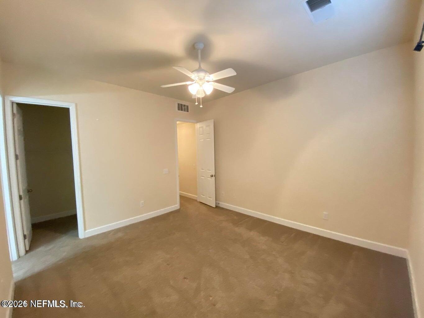 2035 Secret Garden Lane, Unit 504 Fleming Island, FL 32003 - Photo 18 of 32 a view of an empty room