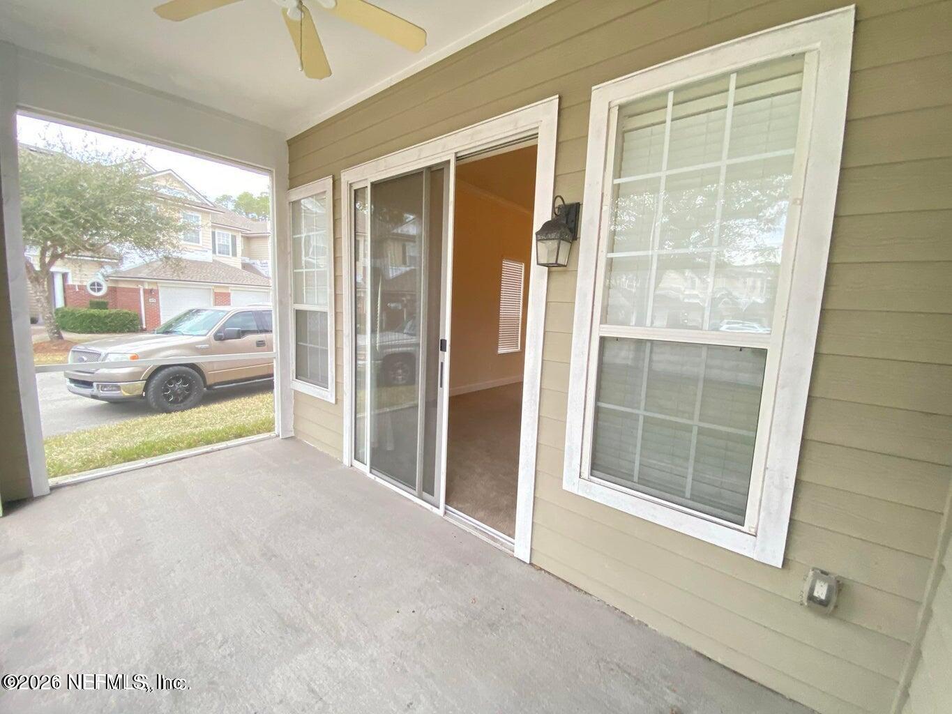 2035 Secret Garden Lane, Unit 504 Fleming Island, FL 32003 - Photo 2 of 32 a view of an empty room and window