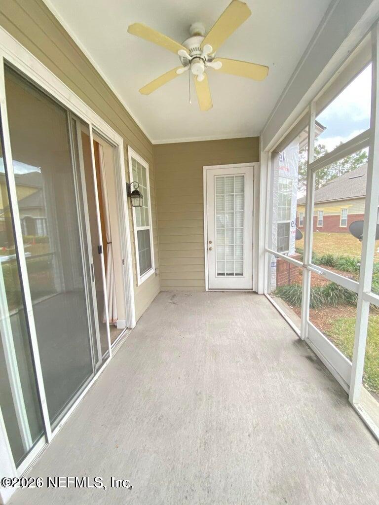 2035 Secret Garden Lane, Unit 504 Fleming Island, FL 32003 - Photo 3 of 32 a view of an empty room with a window