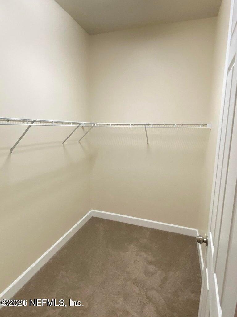 2035 Secret Garden Lane, Unit 504 Fleming Island, FL 32003 - Photo 10 of 32 a view of an empty room