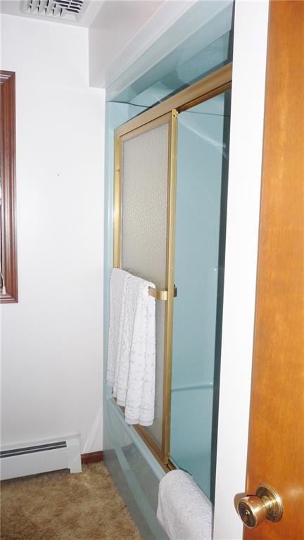 324-328 Guys Run Road Cheswick, PA 15024 - Photo 14 of 25 First floor full bath with one piece tub and shower and matching ceiling.