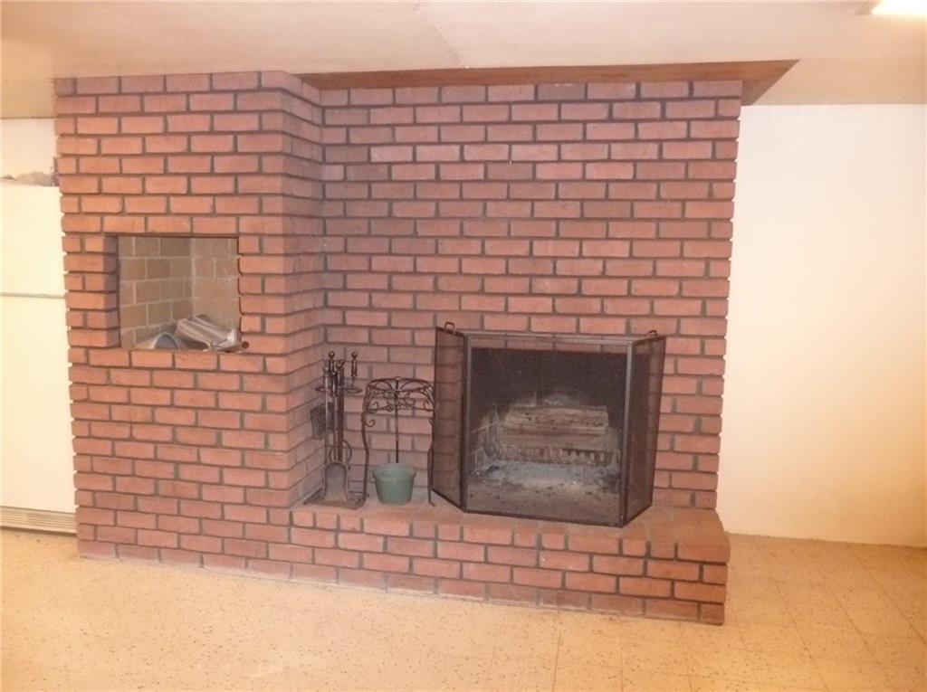 324-328 Guys Run Road Cheswick, PA 15024 - Photo 15 of 25 Partially finished lower level features a log burning fireplace and second flue area future grill or wood fired cooking.