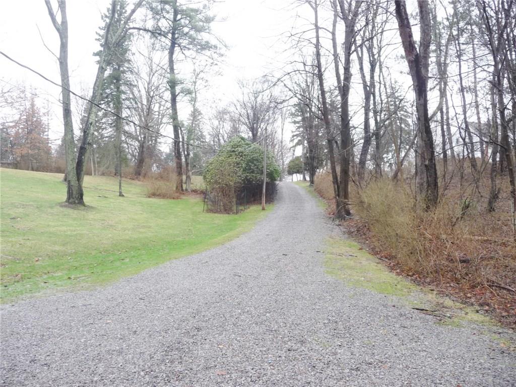 324-328 Guys Run Road Cheswick, PA 15024 - Photo 24 of 25 Gravel drive was refreshed in 2017. Surrounding trees offer a private quiet setting.