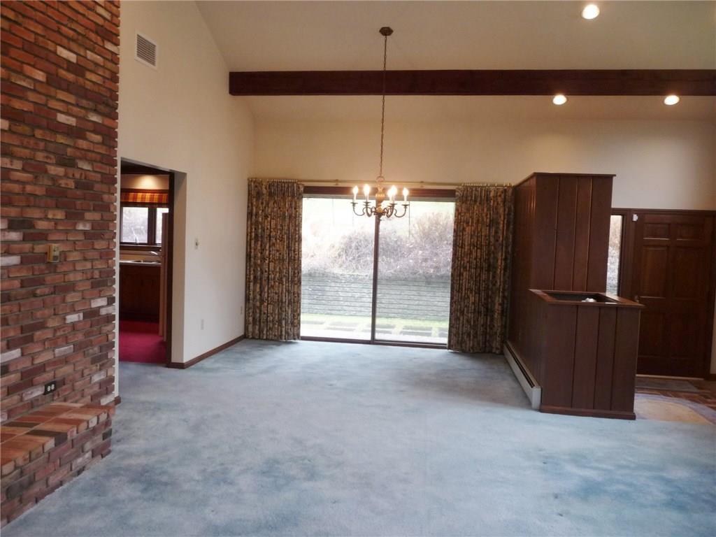 324-328 Guys Run Road Cheswick, PA 15024 - Photo 6 of 25 The dining area with sliding door to the brick patio area.