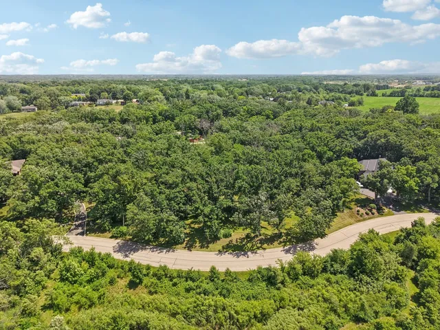 a view of a street with a trees