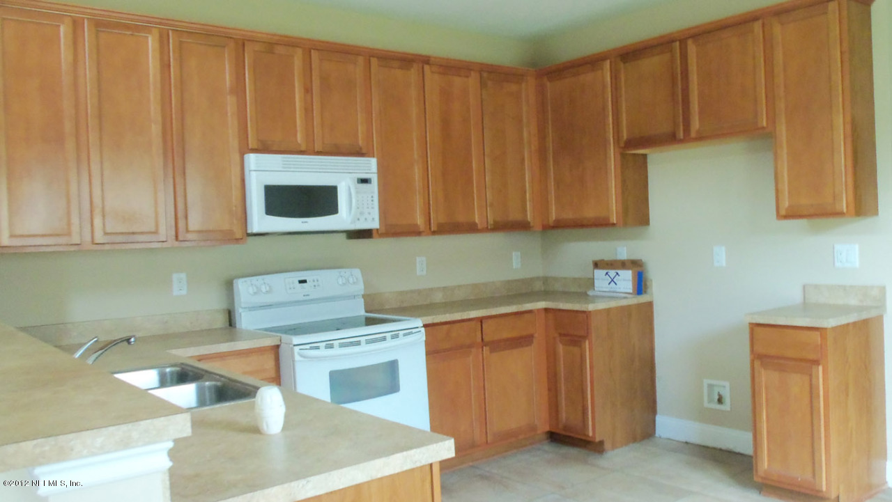 11571 Oaklawn Road Jacksonville, FL 32218 - Photo 6 of 11 Oaklawn-Kitchen-2