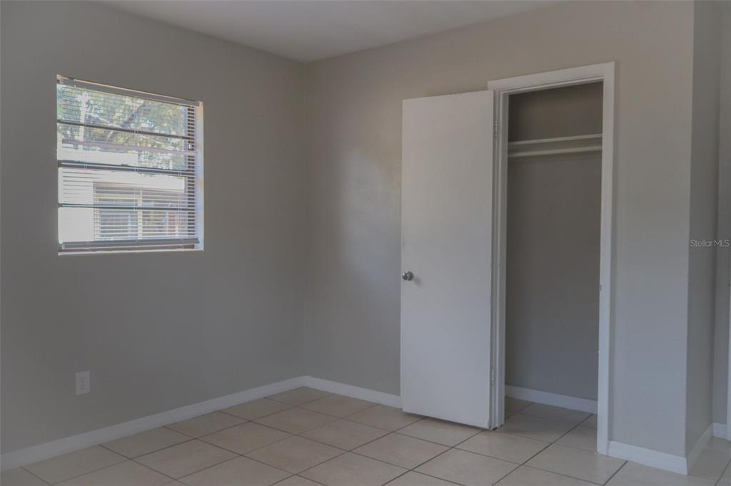 2708 Dixie Road Lakeland, FL 33801 - Photo 23 of 31 a view of an empty room with closet and a window