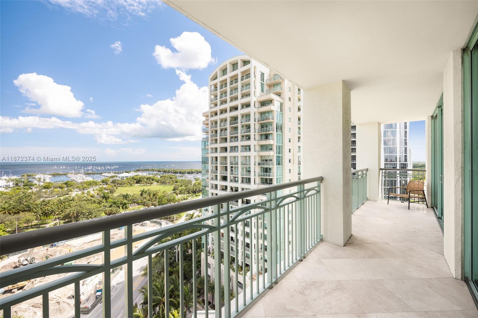 3350 Southwest 27th Avenue, Unit 1402 Miami, FL 33133 - Photo 17 of 23 a view of a city from a balcony
