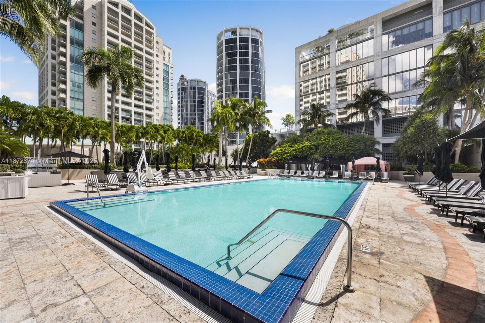 3350 Southwest 27th Avenue, Unit 1402 Miami, FL 33133 - Photo 21 of 23 a view of a swimming pool with a terrace