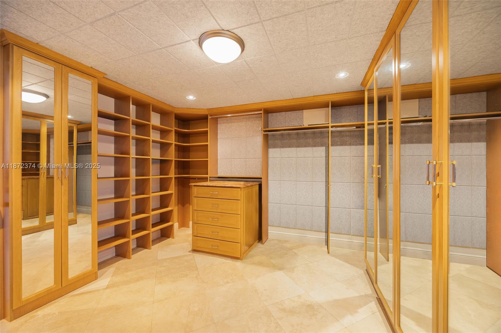 3350 Southwest 27th Avenue, Unit 1402 Miami, FL 33133 - Photo 9 of 23 a view of walk in closet with empty room