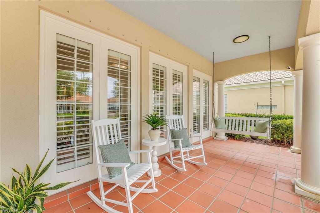 4796 Martinique Way Naples, FL 34119 - Photo 4 of 21 Welcoming front lanai