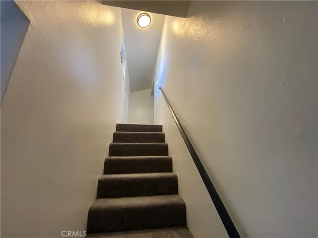 a bathroom with a toilet and a bathtub