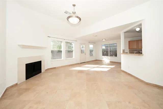 a utility room with sink dryer and washer