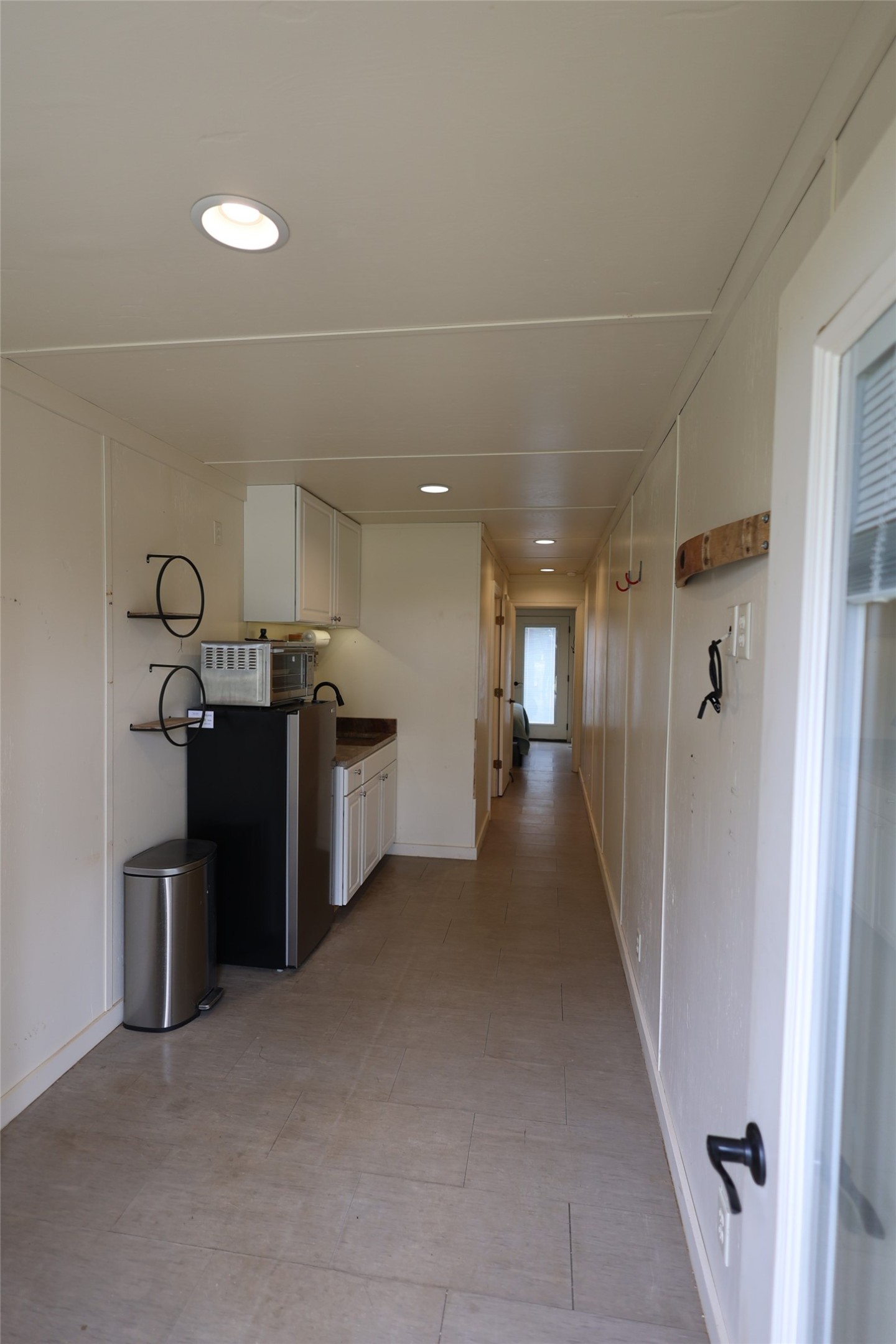 1399 Klett Ranch Road Johnson City, TX 78636 - Photo 2 of 23 a view of a refrigerator and a kitchen