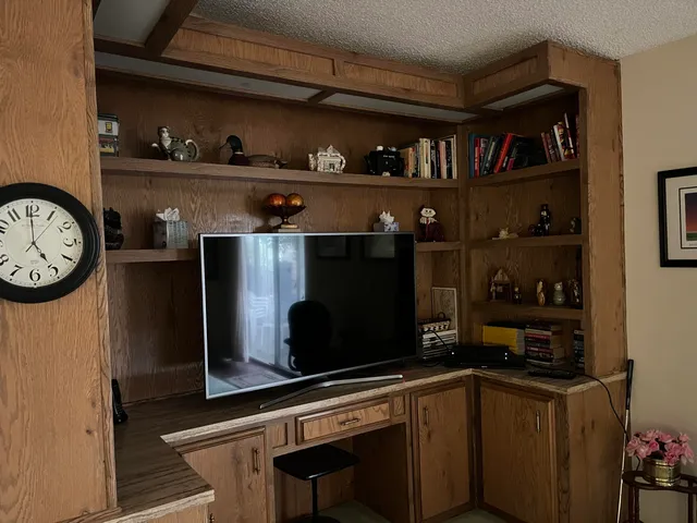 a kitchen with stainless steel appliances granite countertop a stove and cabinets