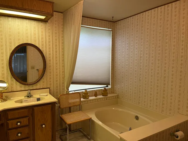 a bathroom with a sink and a bathtub