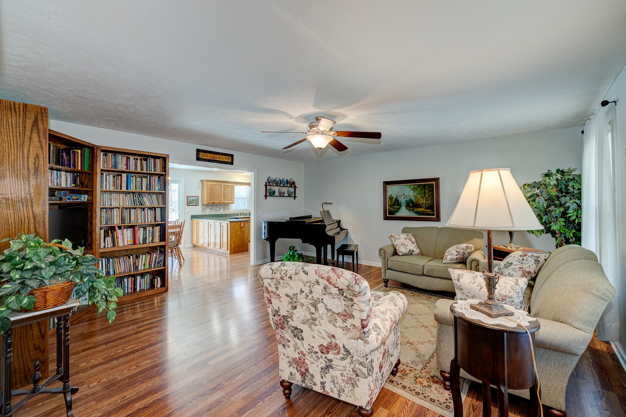 2543 Thompson Road Murfreesboro, TN 37128 - Photo 15 of 46 a living room with furniture and a wooden floor