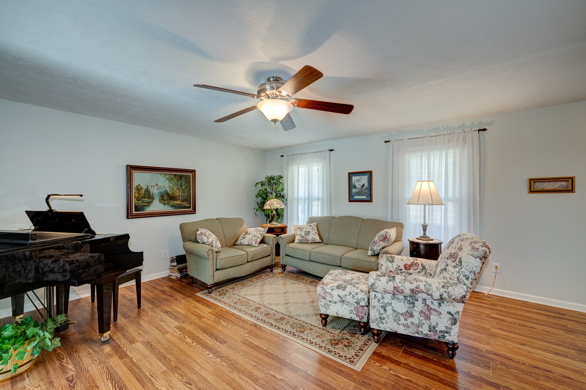 2543 Thompson Road Murfreesboro, TN 37128 - Photo 16 of 46 a living room with furniture and a wooden floor