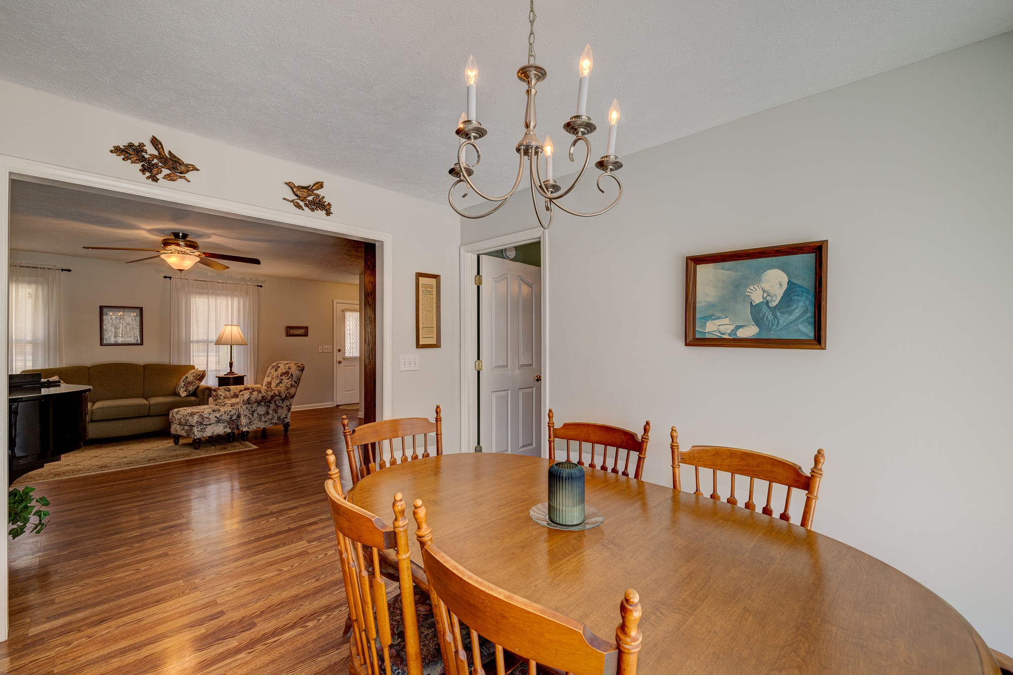 2543 Thompson Road Murfreesboro, TN 37128 - Photo 18 of 46 a view of a dining room with furniture and wooden floor