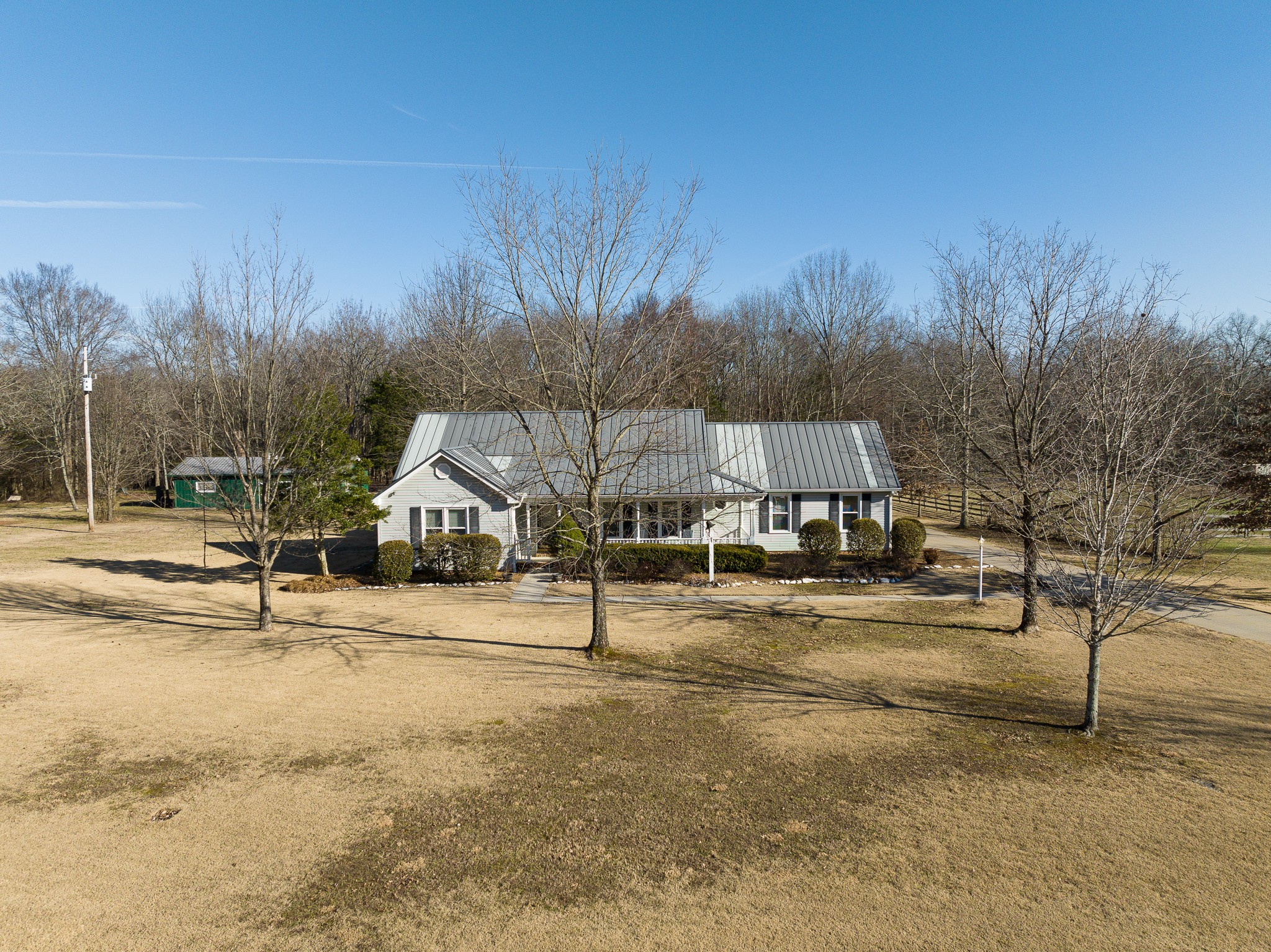 2543 Thompson Road Murfreesboro, TN 37128 - Photo 2 of 46 a view of a house with a yard and covered with snow