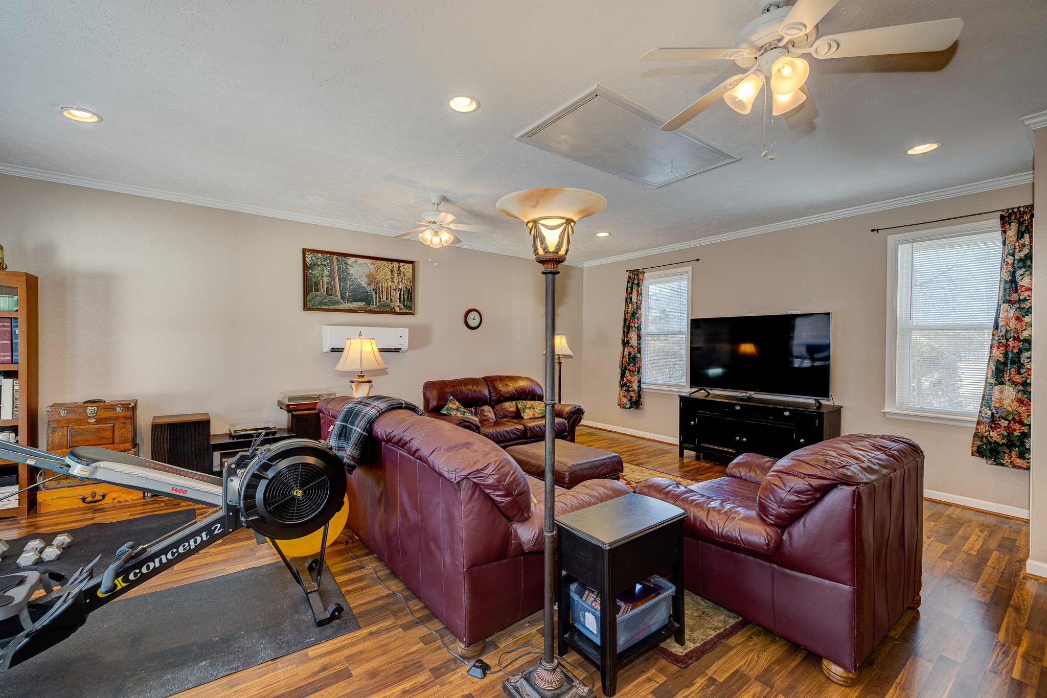 2543 Thompson Road Murfreesboro, TN 37128 - Photo 29 of 46 a living room with furniture a flat screen tv and kitchen view