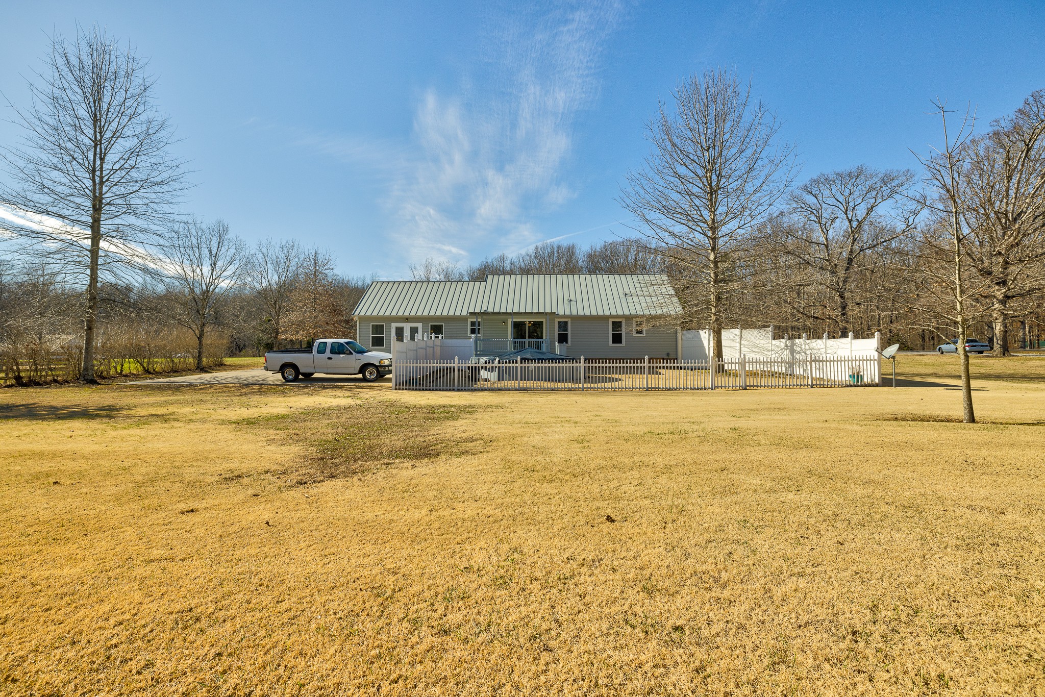 2543 Thompson Road Murfreesboro, TN 37128 - Photo 36 of 46 a swimming pool with outdoor seating and yard