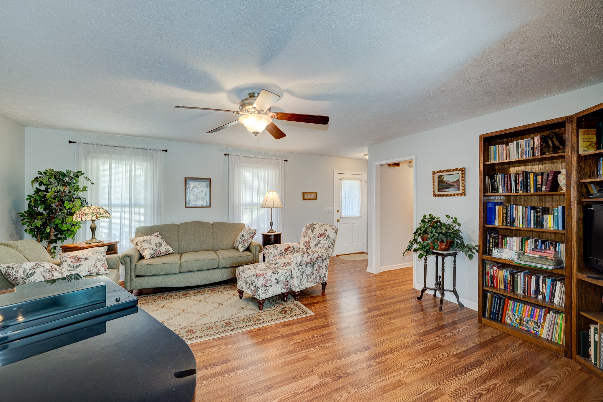 2543 Thompson Road Murfreesboro, TN 37128 - Photo 10 of 46 a living room with furniture and a book shelf