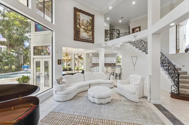 a living room with furniture and a rug