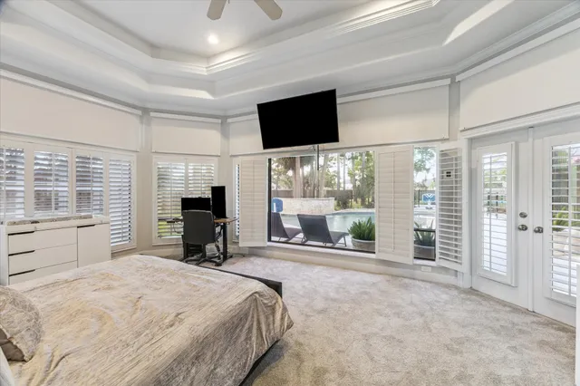 a spacious bathroom with a granite countertop tub sink and mirror